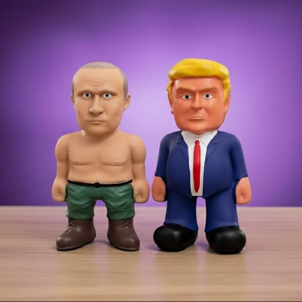 Two figurines, one shirtless and one in a suit, on a wooden surface with a purple background