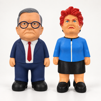 MEGA Anthony Albanese and Pauline Hanson dog toys standing side by side on an off-white background.
