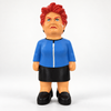 Front view of the MEGA Pauline Hanson dog toy with swept red hair, blue jacket, black skirt and shoes.