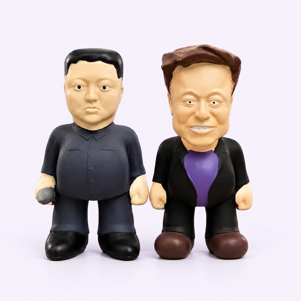 Rocket Lovers bundle with the original Kim Jong-un and Elon Musk dog toys side by side, including Kim’s small moulded hand accessory.