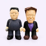 Rocket Lovers bundle with the original Kim Jong-un and Elon Musk dog toys side by side, including Kim’s small moulded hand accessory.